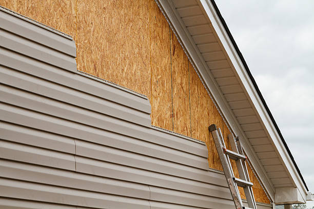 Professional Siding Repair technician working in Stone Mountain, GA